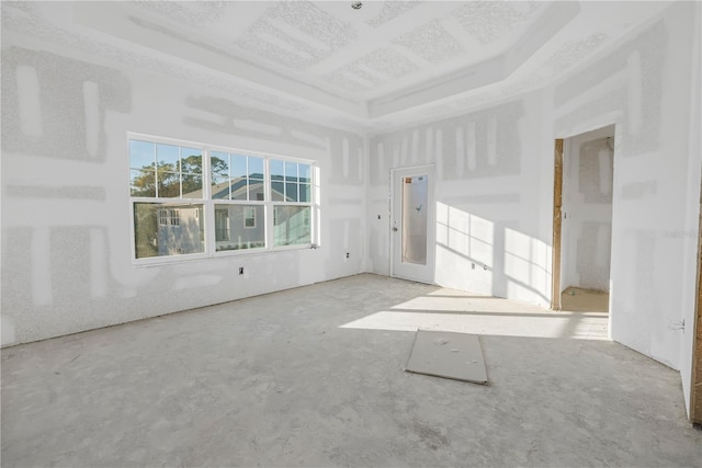 spare room featuring a high ceiling