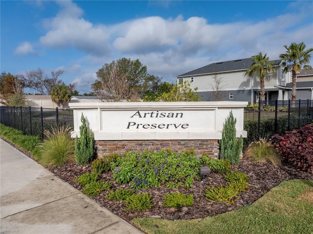 community sign with fence