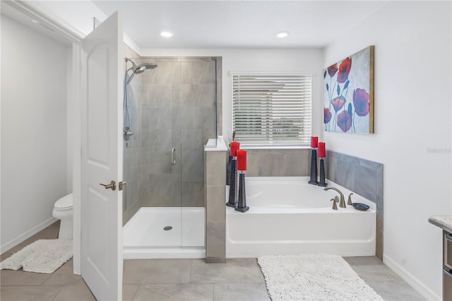 full bathroom featuring vanity, toilet, and independent shower and bath