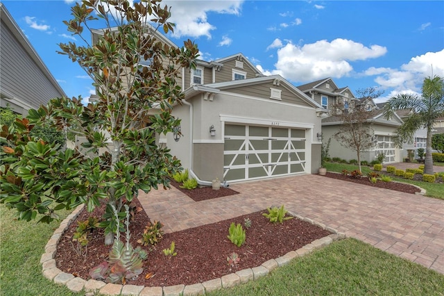 view of front of home with a garage