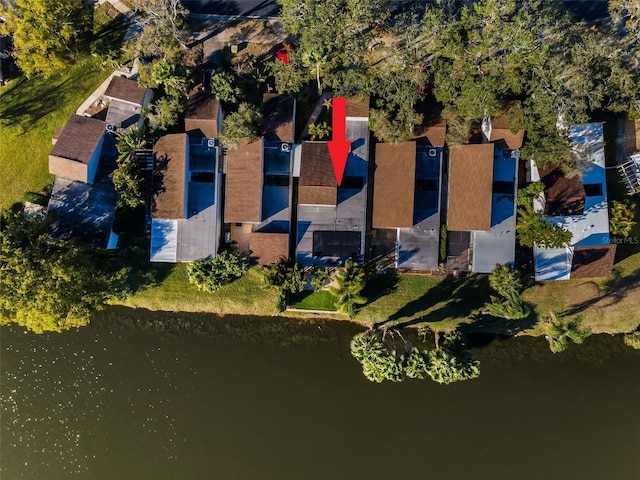 birds eye view of property featuring a water view