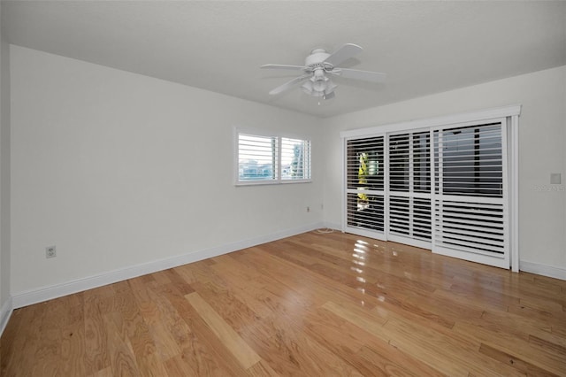 spare room with ceiling fan and light hardwood / wood-style floors