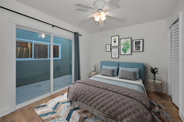 bedroom with ceiling fan and light wood-type flooring