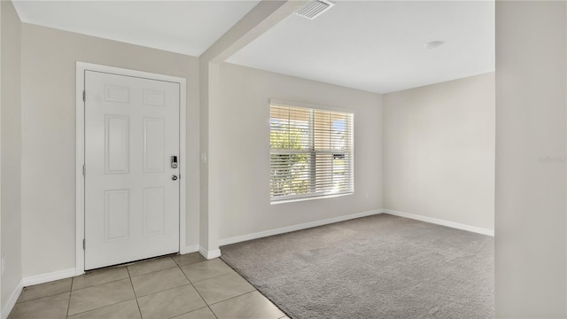 view of tiled foyer entrance