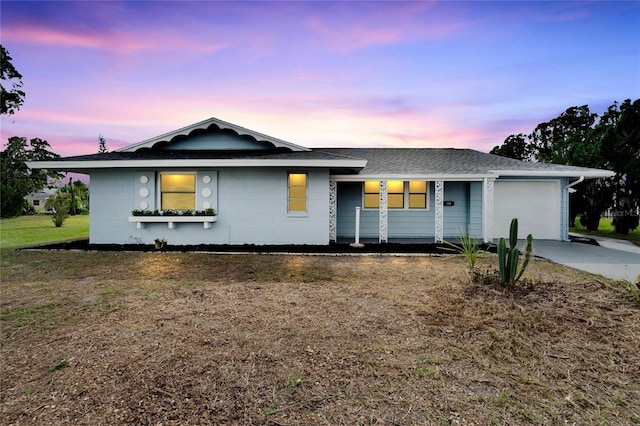 single story home with a garage