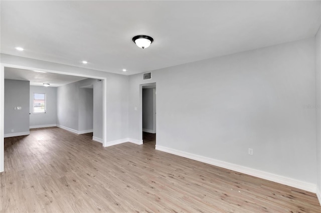 empty room featuring light hardwood / wood-style floors