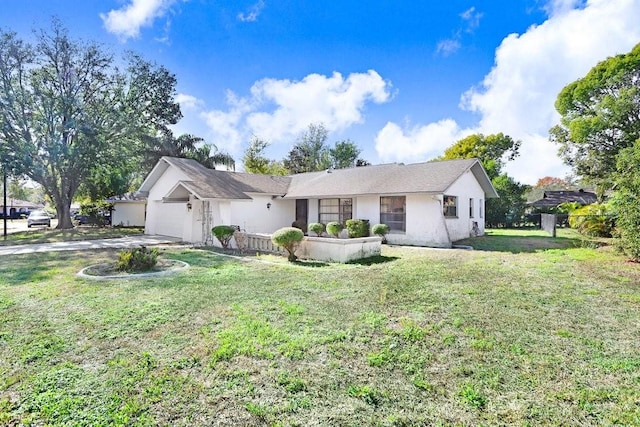 ranch-style home with a front lawn