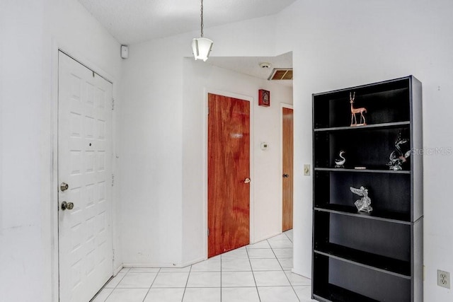 hallway with light tile patterned flooring