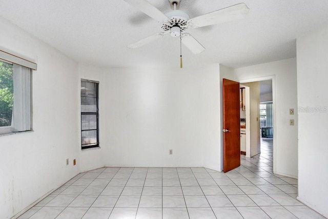 spare room with ceiling fan