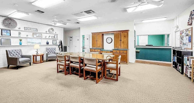 dining area with ceiling fan