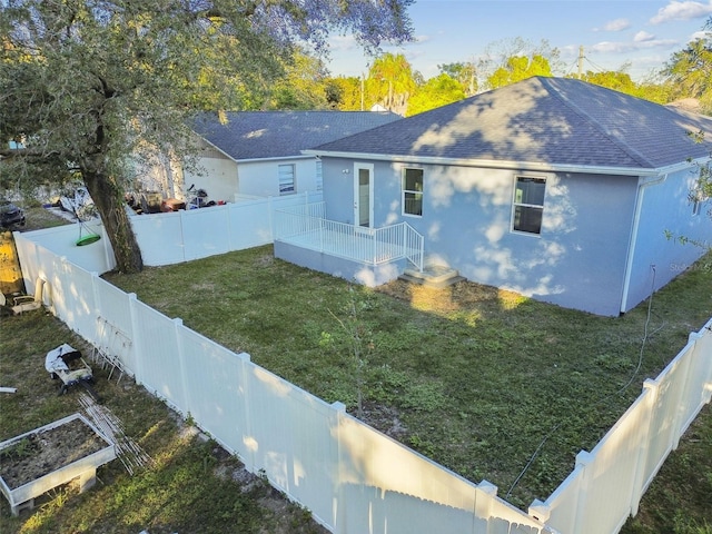 exterior space featuring a front yard