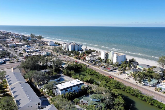 bird's eye view featuring a view of the beach and a water view