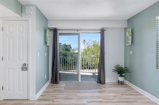 entryway with light wood-type flooring