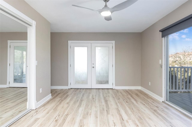 interior space with ceiling fan, french doors, and light hardwood / wood-style flooring