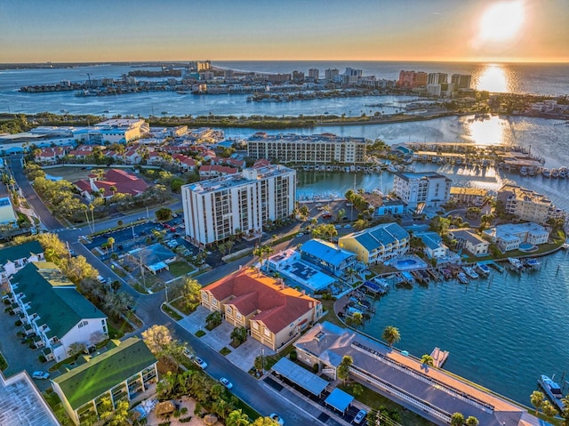 aerial view at dusk with a water view