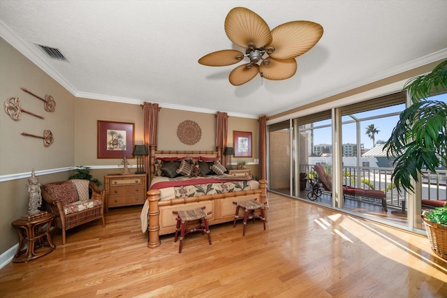 bedroom featuring ceiling fan, access to exterior, crown molding, and light wood-type flooring