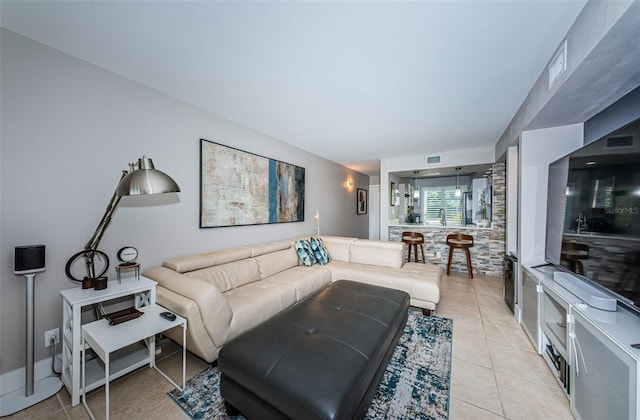 living room featuring light tile patterned floors