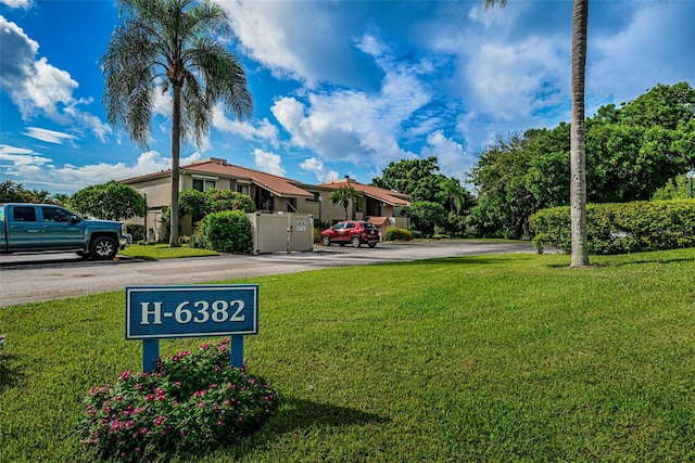 exterior space with a front lawn