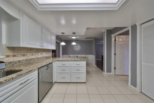 kitchen with kitchen peninsula, tasteful backsplash, light tile patterned floors, dishwasher, and white cabinetry