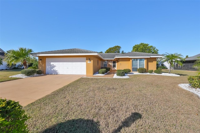 single story home with a front yard and a garage