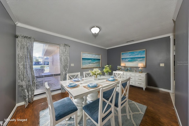 dining room featuring a textured ceiling, dark hardwood / wood-style flooring, and crown molding