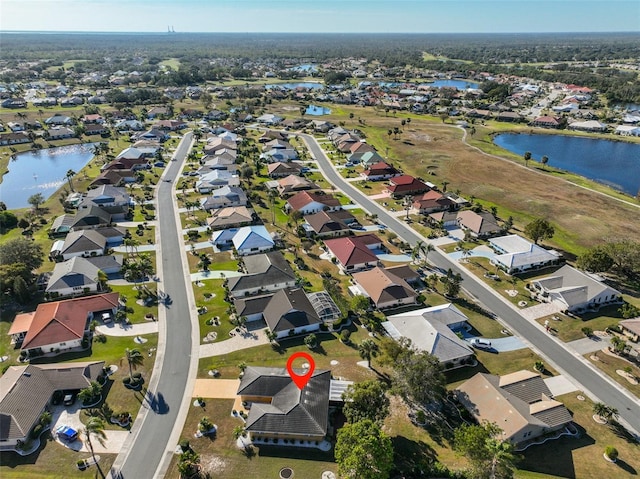 drone / aerial view featuring a water view