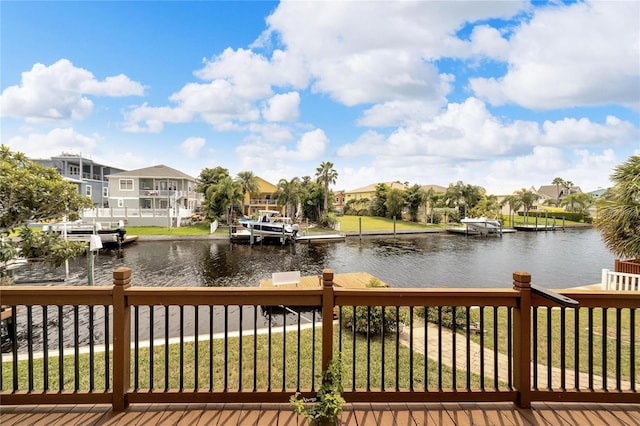 exterior space with a water view and a yard