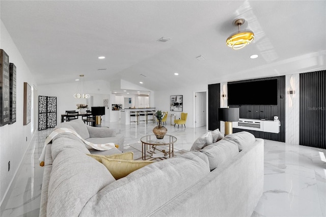 living room featuring lofted ceiling