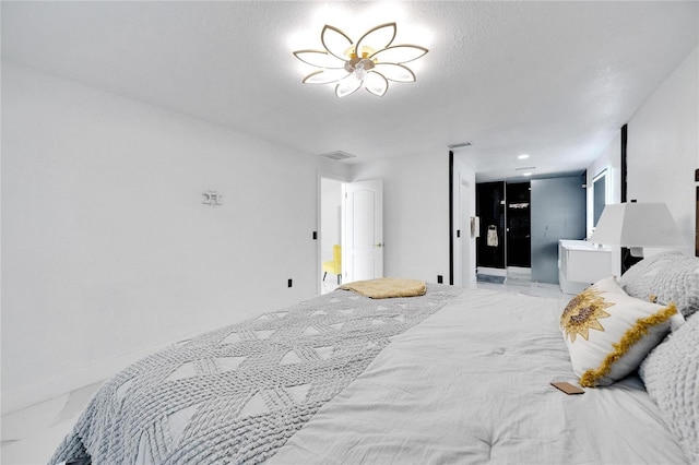 bedroom with a textured ceiling