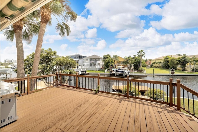 wooden terrace with a water view