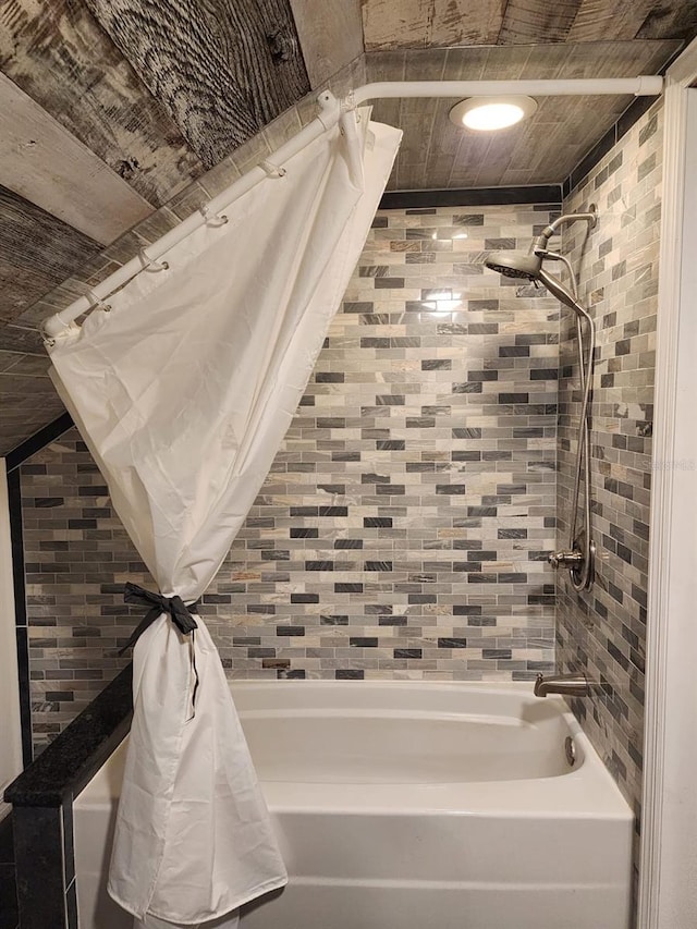 bathroom with shower / tub combo with curtain