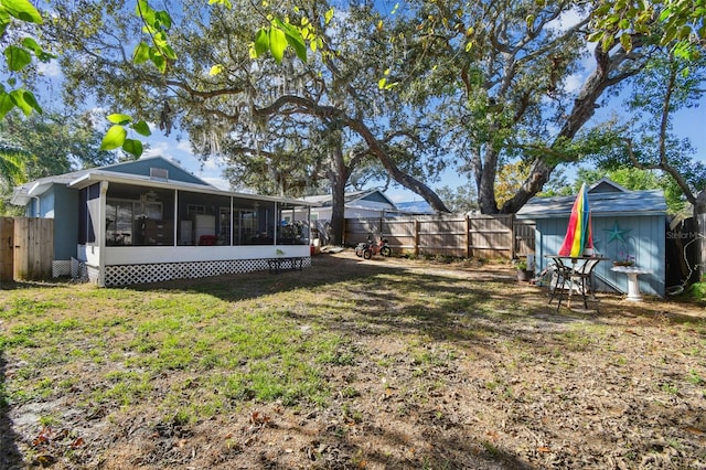 view of yard with a sunroom