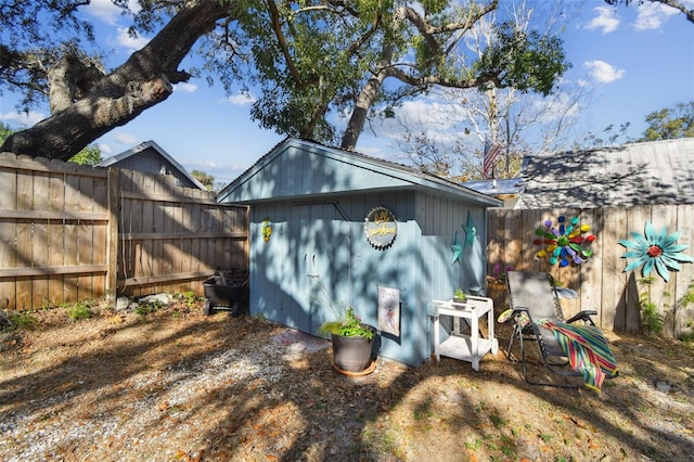 view of property exterior featuring a shed