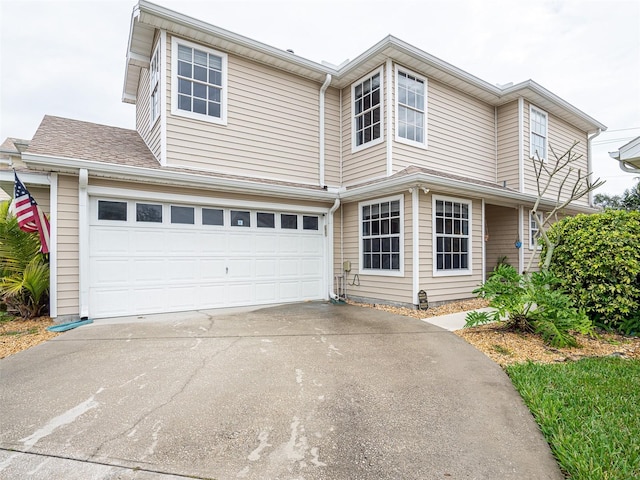 view of property featuring a garage