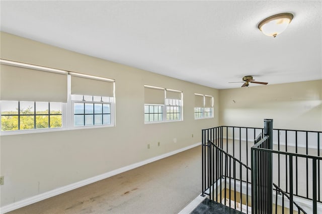 hallway featuring carpet floors