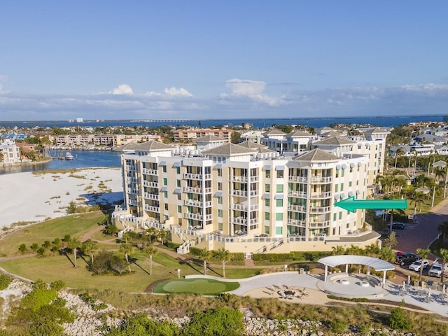 birds eye view of property with a water view