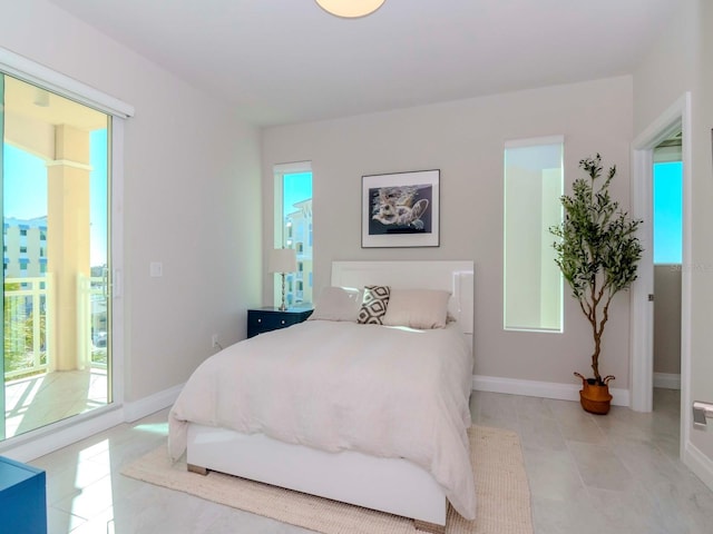 bedroom with multiple windows