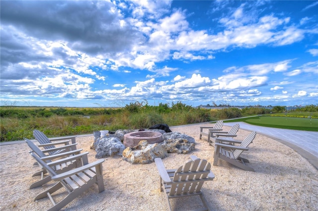 view of patio featuring a fire pit