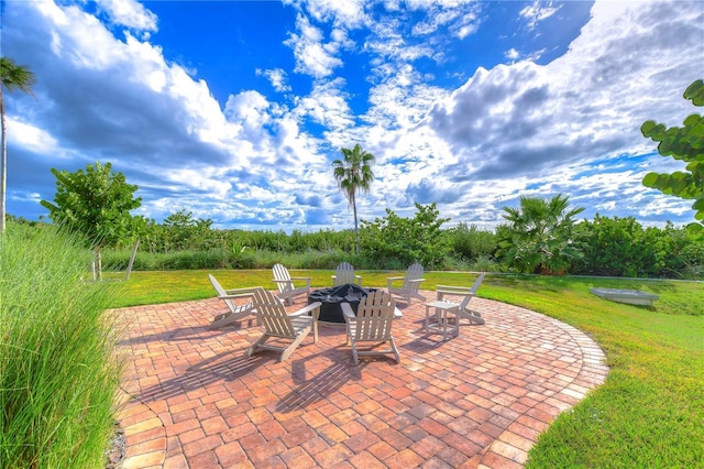 view of patio featuring a fire pit