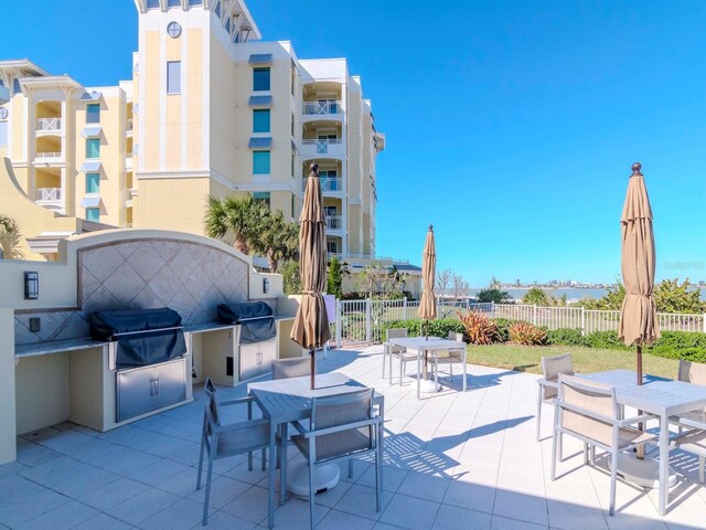 view of patio featuring a grill and exterior kitchen