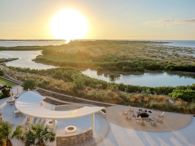 water view featuring an outdoor fire pit