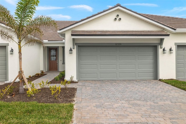 single story home featuring a garage