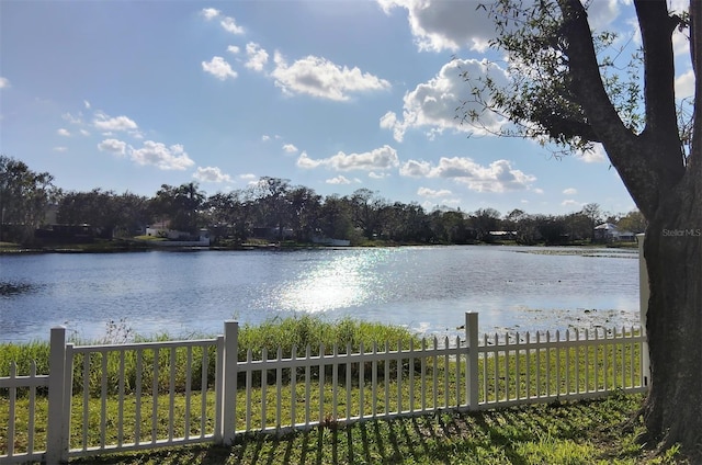 property view of water with fence