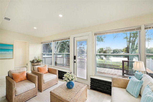 sunroom featuring visible vents