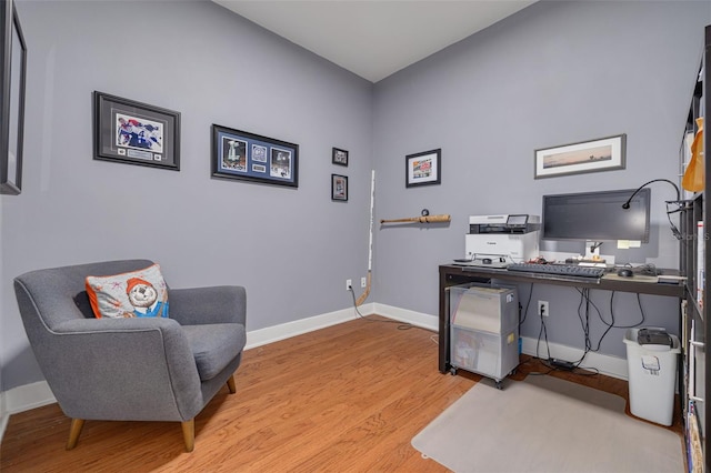 office space with light hardwood / wood-style floors