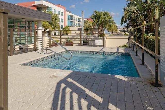 view of pool featuring a patio area