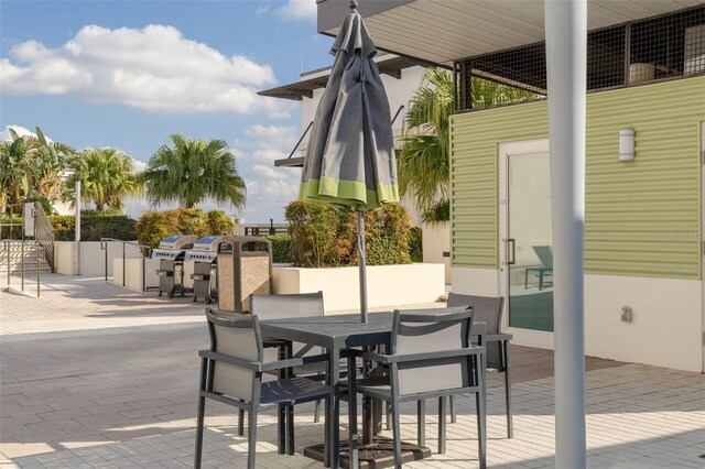 1120 E Kennedy Blvd Unit 1221, Tampa, FL 33602 - view of patio / terrace featuring outdoor dining area