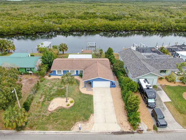 drone / aerial view with a water view