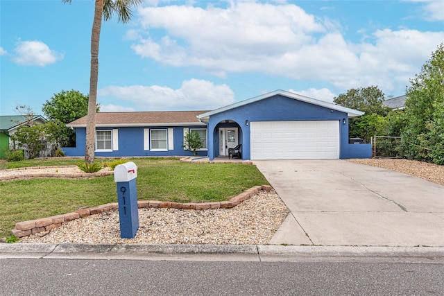 single story home with a garage and a front yard