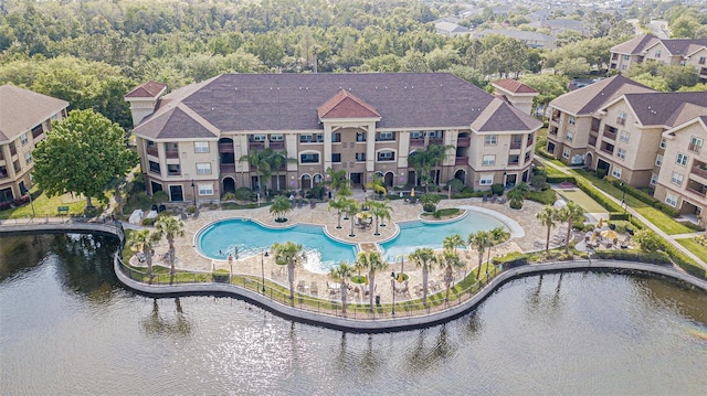 drone / aerial view with a water view